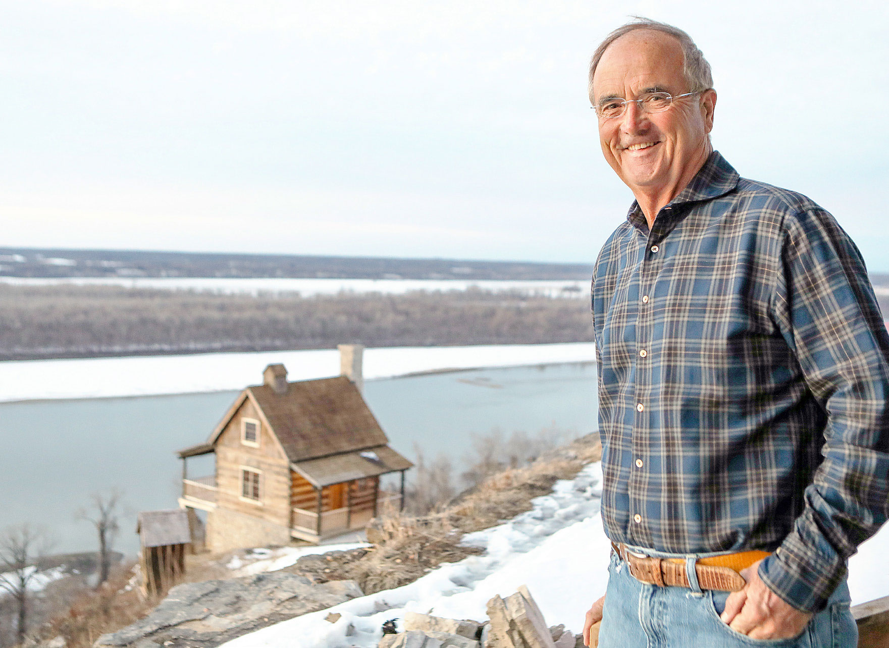 David Hoffmann stands on his back porch, overlooking the Missouri River in St. Albans.