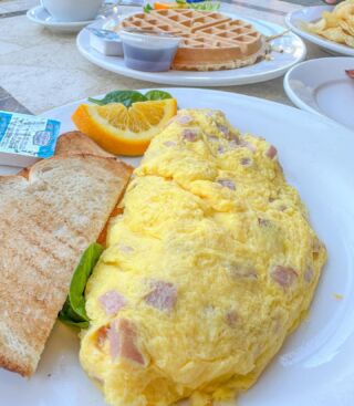 Start your morning off the right way with a delicious breakfast from The Cafe on 5<sup>th</sup>! From pancakes, omelets to waffles, their mouthwatering menu has something for everyone. #BreakfastAtTheCafeOn5th